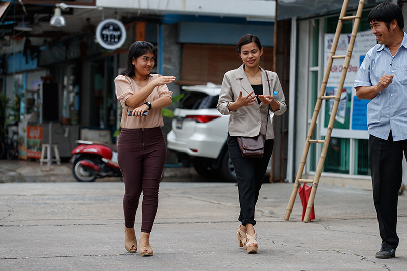 group walking down the sidewalk
