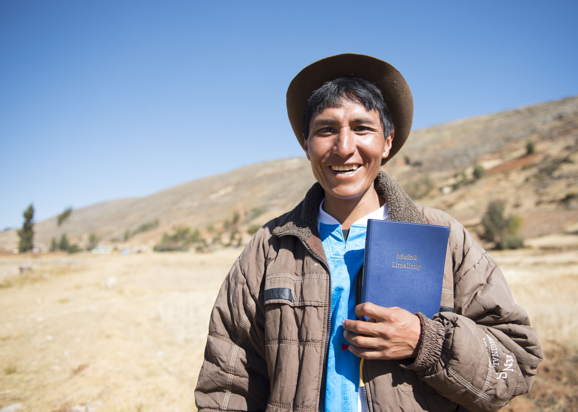 Robert holding the New Testament