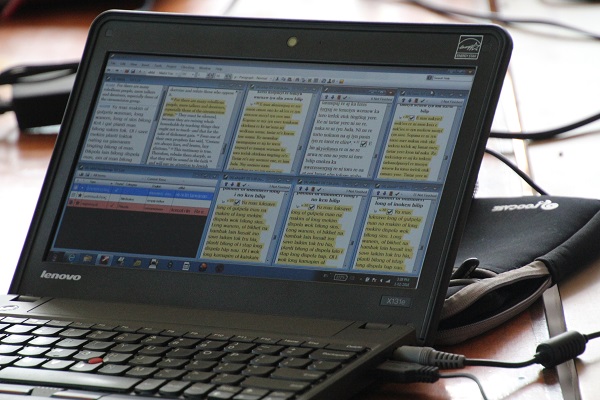 A computer screen with different passages open for cross-referencing