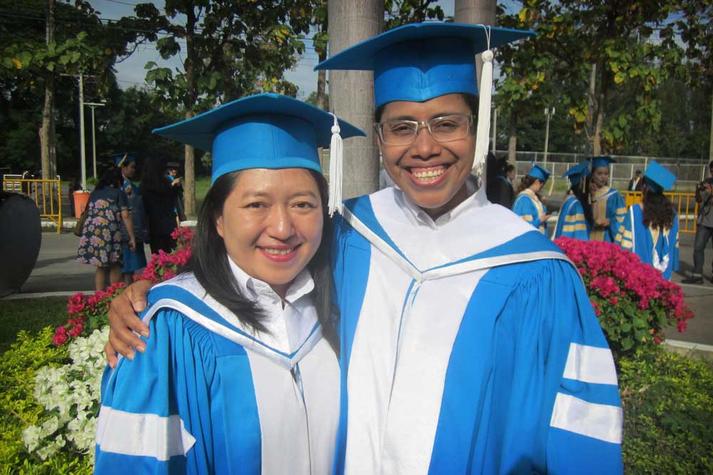 Mis and a friend at her recent graduation ceremony