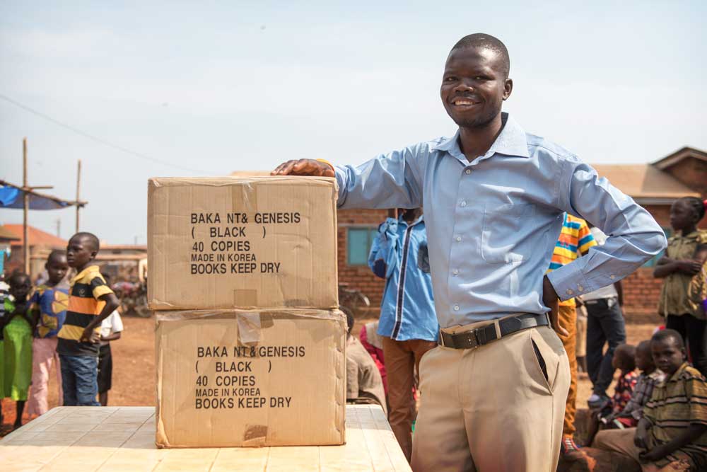Box of newly translated Baka Bibles