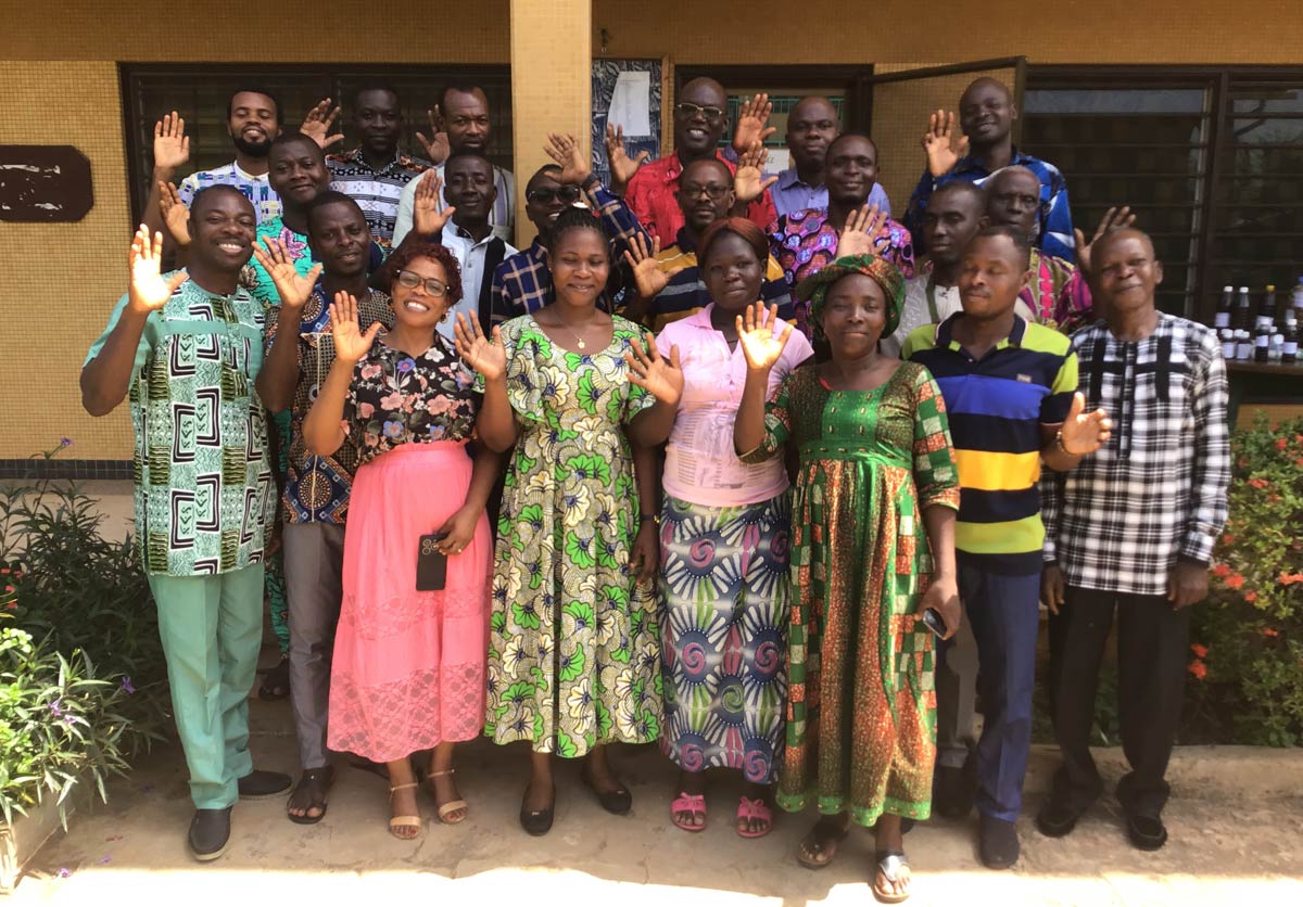 Kwi Cluster group photo at the end of a retreat.