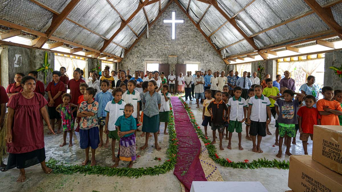 /></figure>
<p>As the Saliba community embraces this treasure, their journey of transformation and spiritual growth begins.</p>
<aside class= Members of the Saliba community church.