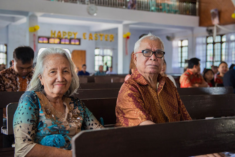 People attending service in Ambonese.