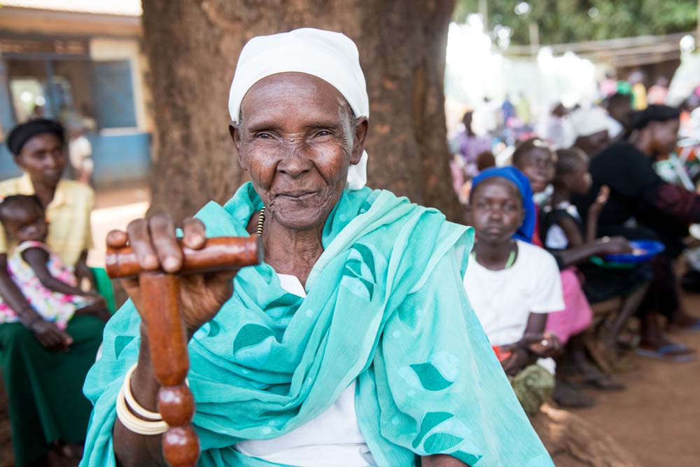 Elderly woman smiling.