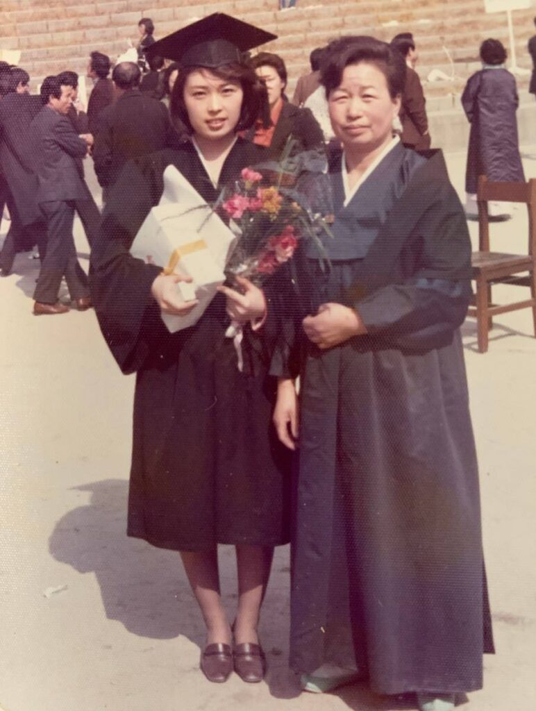 Il Hwe and Chong Soo on her graduation day.