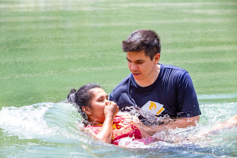 Pastor Robb baptizes a new believer