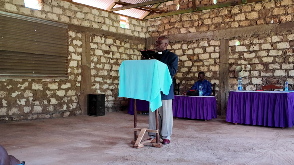 Pastor preaching from New Testament