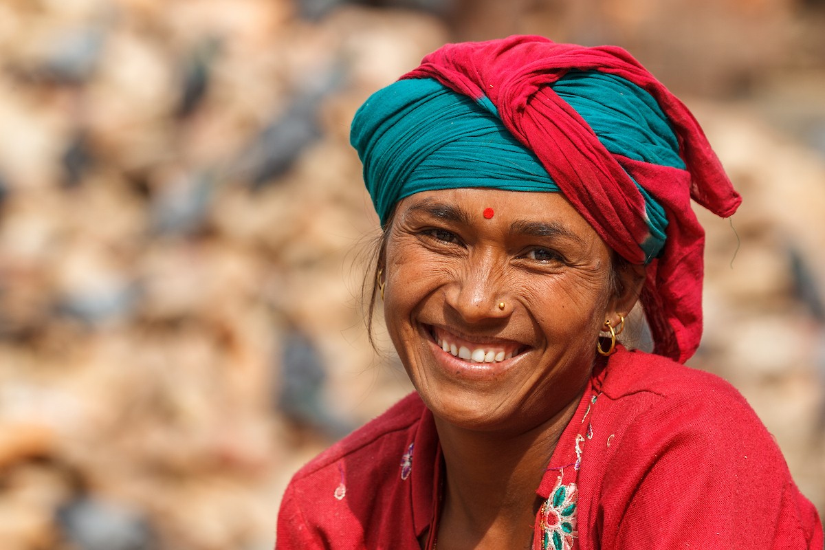 Woman from Nepal smiling.