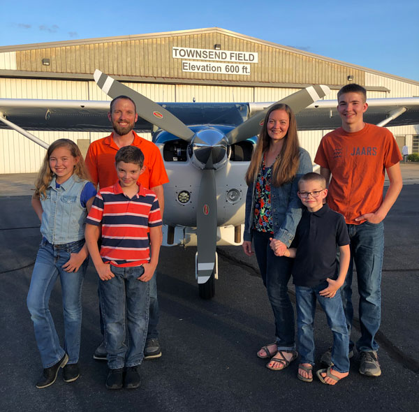 Dan and Rachel with their children at Townsend Field near the JAARS Center.