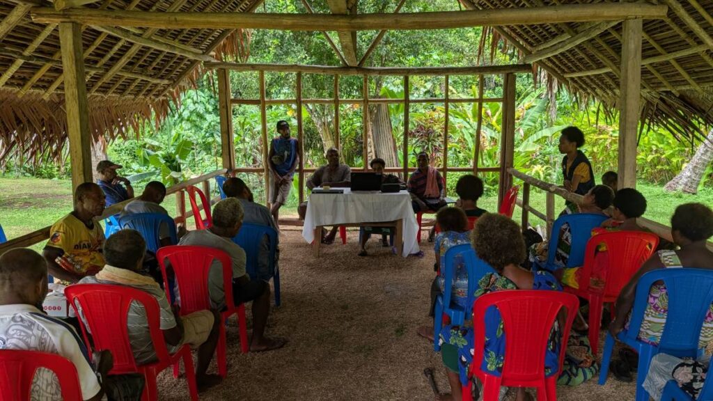 People from the Wanbel community in Papua New Guinea gathering in a church.