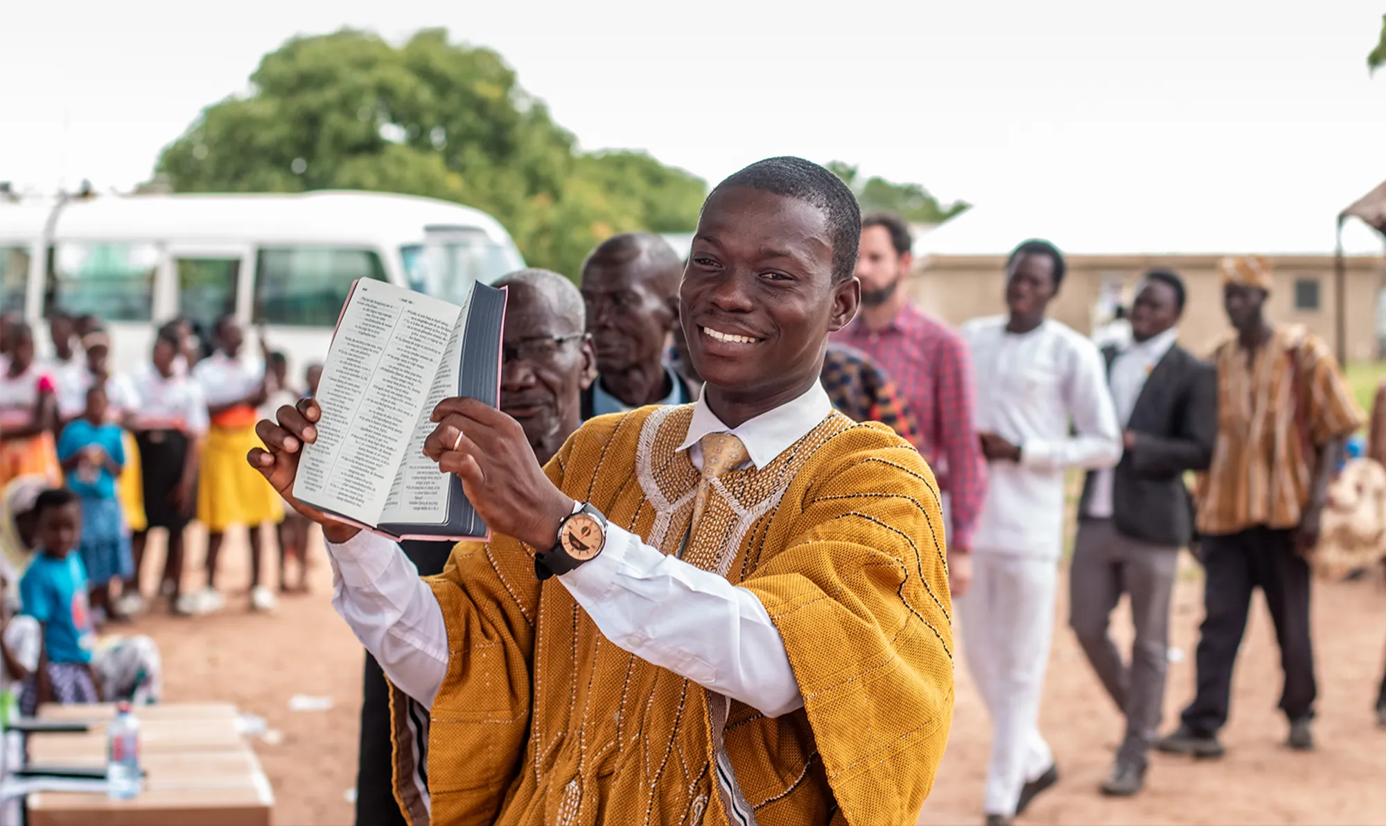 Line of men celebrating Scripture in Africa